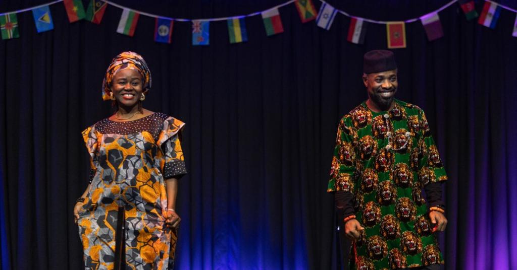 Students model cultural dress at a cultural fashion show