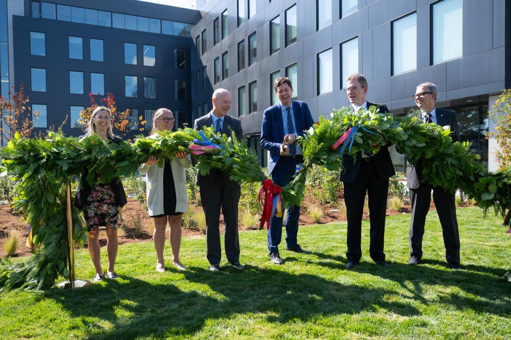 Cedar ribbon is cut to commemorate the opening of RRU Langford, John Horgan campus
