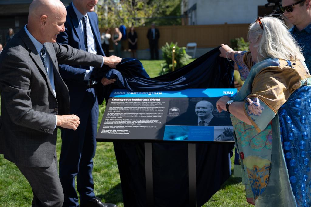 A commemorative plaque for John Horgan is unveiled.