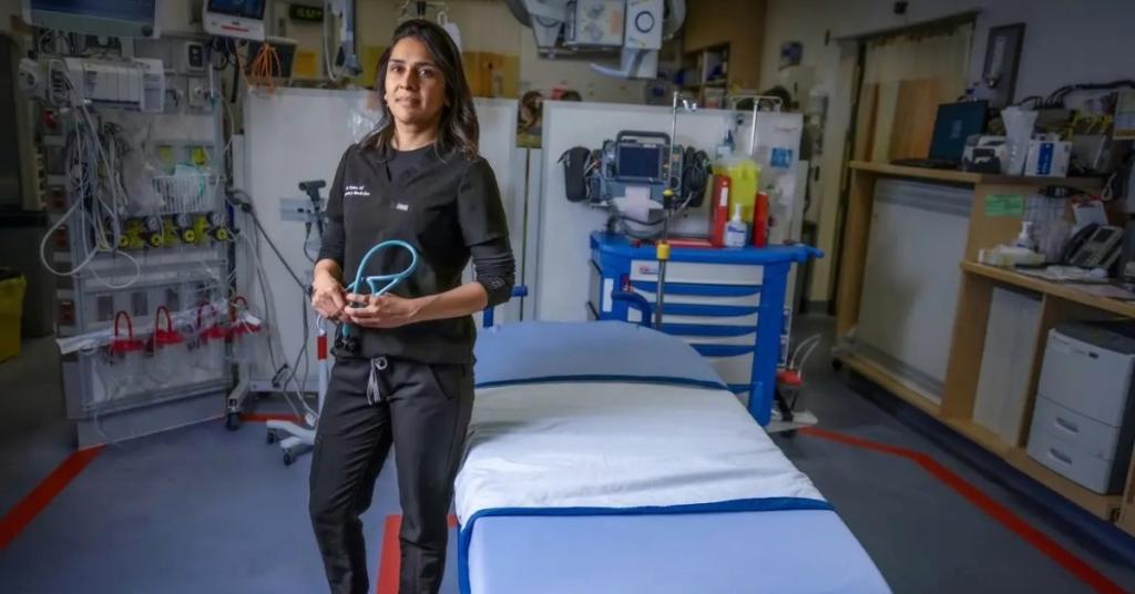 Dr. Huma Ali stands in an emergency room 