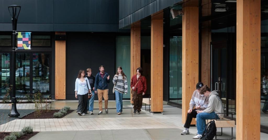 People walking outside John Horgan Campus