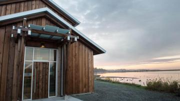 Sneq'wa e'lun gathering space is located on the shore of Esquimalt Lagoon.