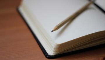 paper-notebook-with-pencil