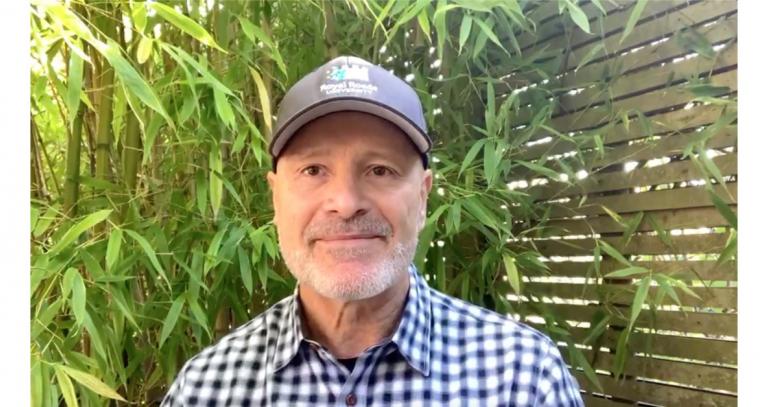 Portrait of Philip Steenkamp with greenery in background