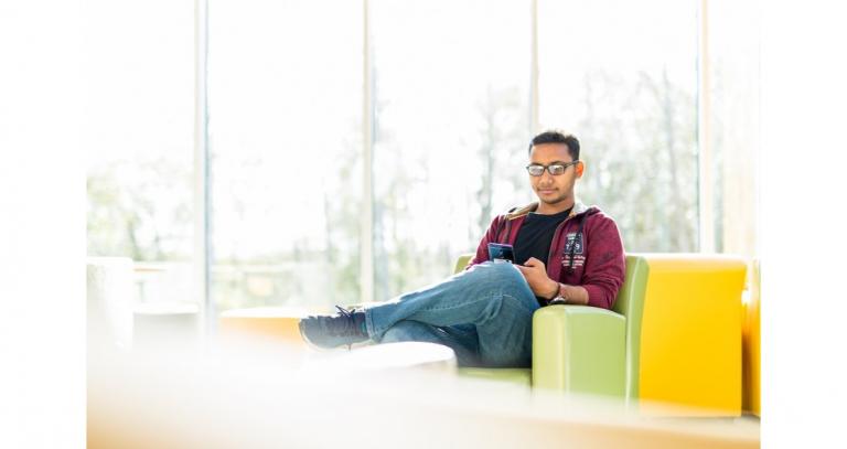 Student-mahbubul-alam-shoura-sitting-with-phone