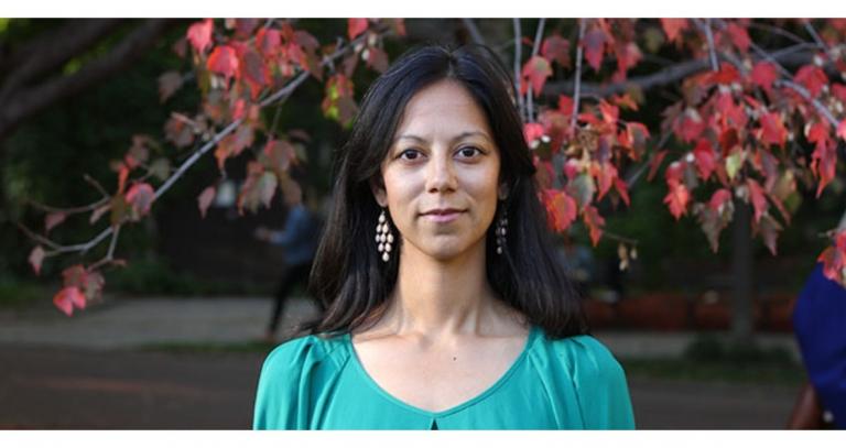 runa_das-in-front-of-tree-with-red-leaves