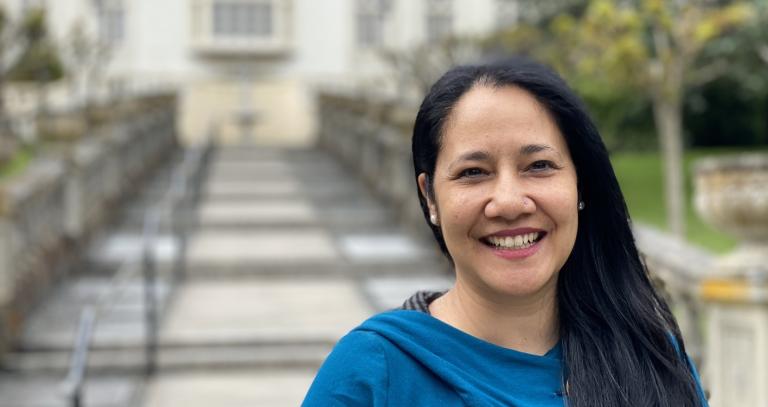 Assistant professor Athena Madan in front of the Neptune Stairs.