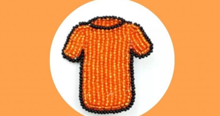 Example of a beaded orange shirt