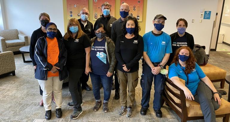 Custodial and Housekeeping staff group photo with the President.
