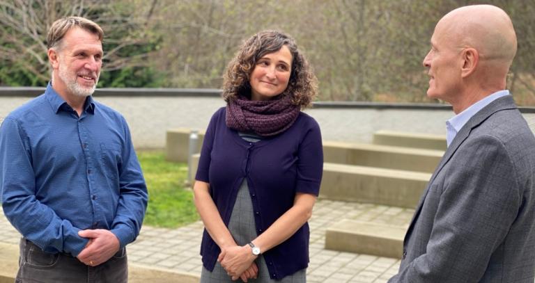 President Philip Steenkamp chats with Michael Pardy and Amy Zidulka in the outdoor classroom. 