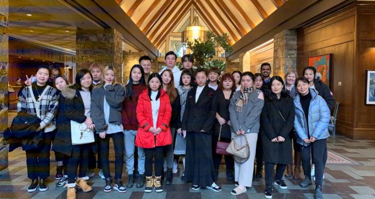 Large group of students in a Whistler, BC hotel lobby