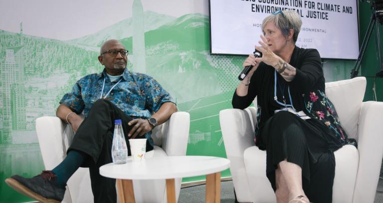 Deb Morrison(right) speaks with Dr. Robert Bullard (left) on strategic coordination for climate and environmental justice