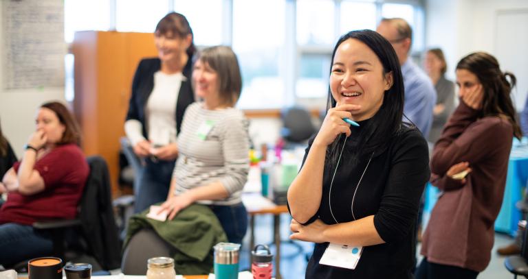 Students laughing in a classroom