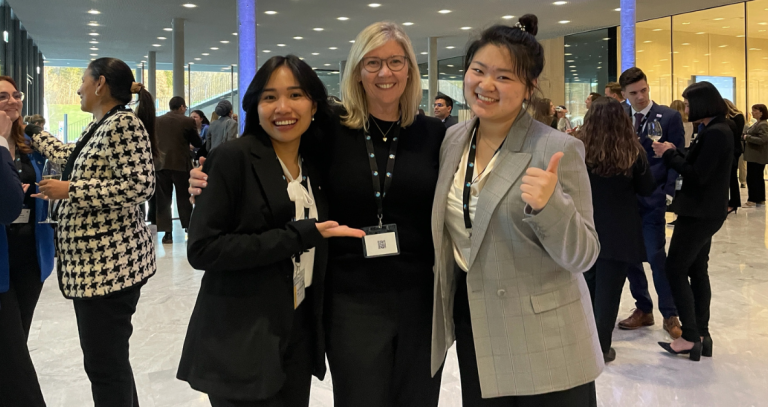 Two RRU students and their RRU instructor pose for a picture while at the Young Hospitality Conference in Switzerland.