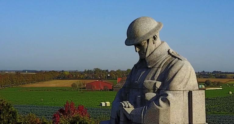 Image of The Brooding Soldier - a large stone monument of a solder in First World War uniform that rises over the countryside in Belgium.