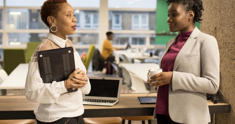 two people networking and chatting