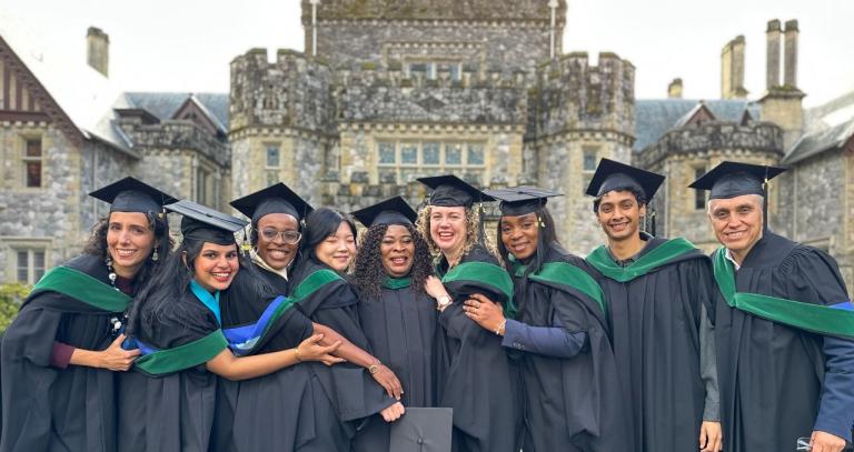 Graduates pose in front of Hatley Castle