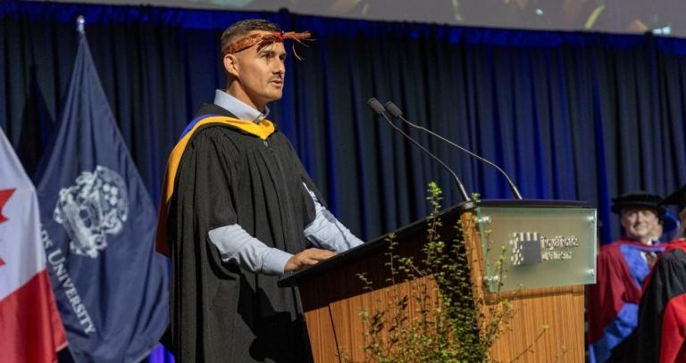 Tyson Atleo speaks during Fall 2025 Convocation