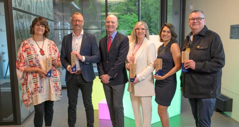 From left to right: Kelly Terbasket, James Hanson, President Philip Steenkamp, Bonnie Blakley, Dr. Huma Ali, Dan George