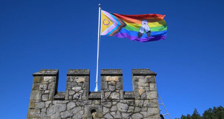 Two-Spirit Intersex-Inclusive Pride flag flying atop Hatley Castle