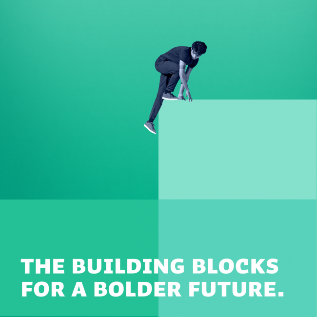 A person climbs up green blocks with the text, "The Building Blocks for a Bolder Future."