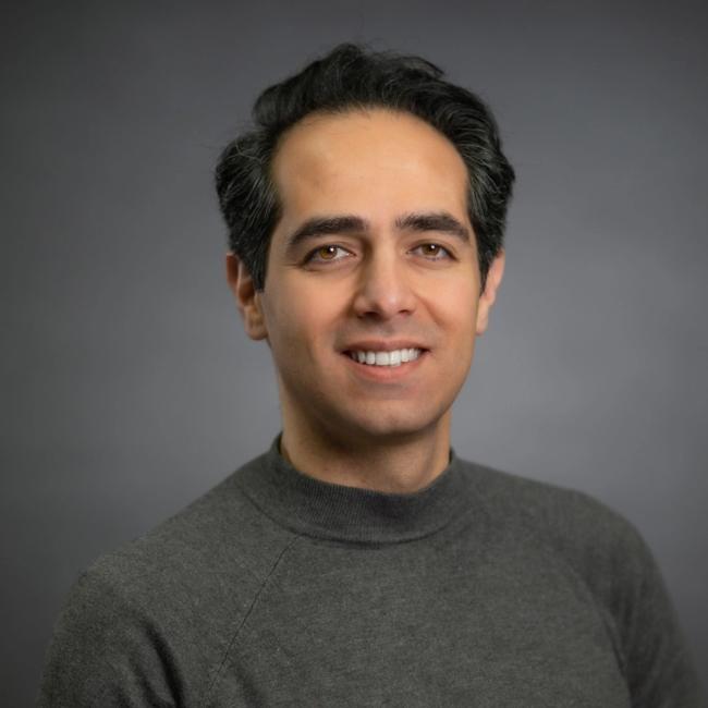 Mahmood Fayazi smiling 