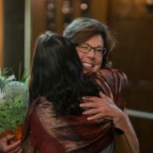 Two people hugging