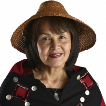 Lillian Howard smiles softly at the camera.