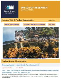 Page 1 of the research ebulletin for June 9, 2023, with an RRU-branded header, image of a coastal wolf, and text.